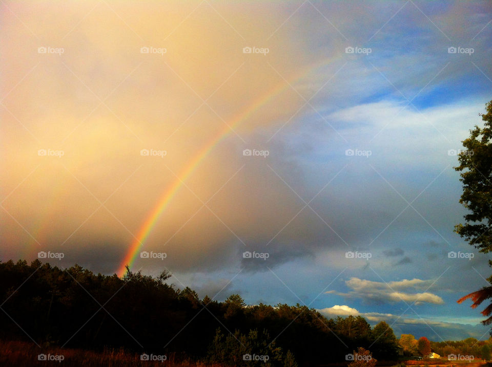 sky rainbow storm autumn by serenitykennedy