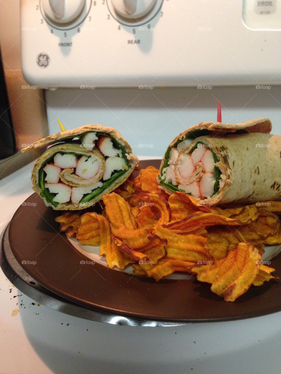 Seafood wrap and chips.