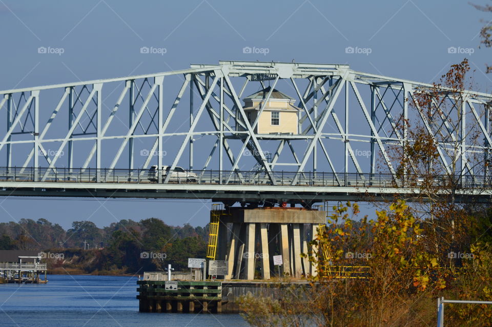 swinging bridge over coastal waterway