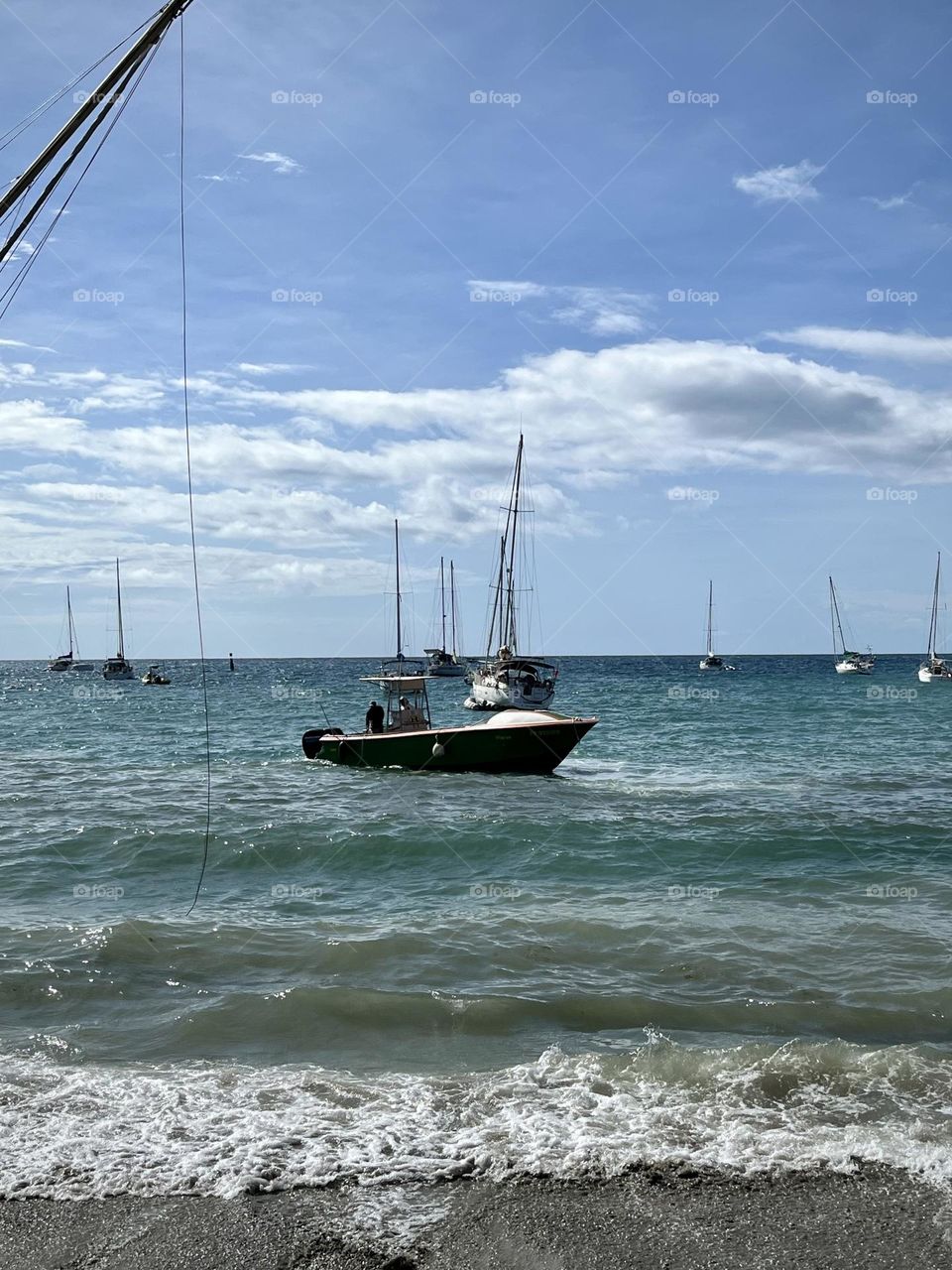 Boat on the edge of a Caribbean beach