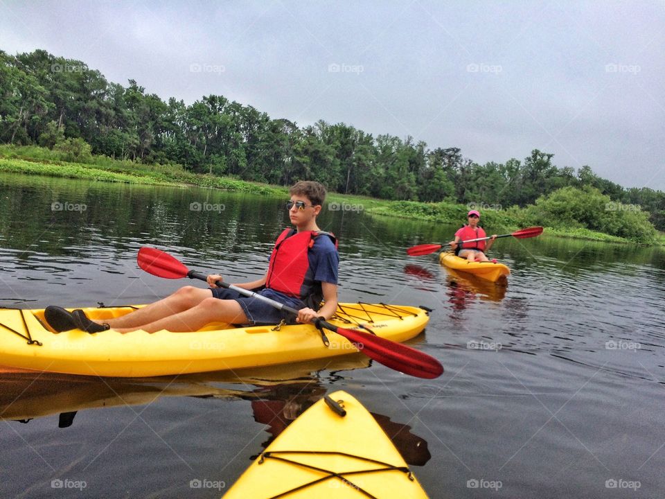 Teenage boy in kayak