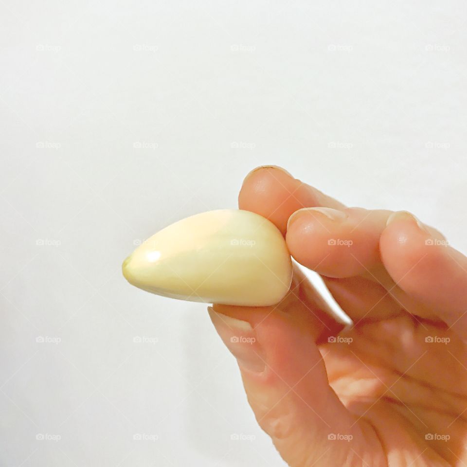 Garlic Clove in Hand