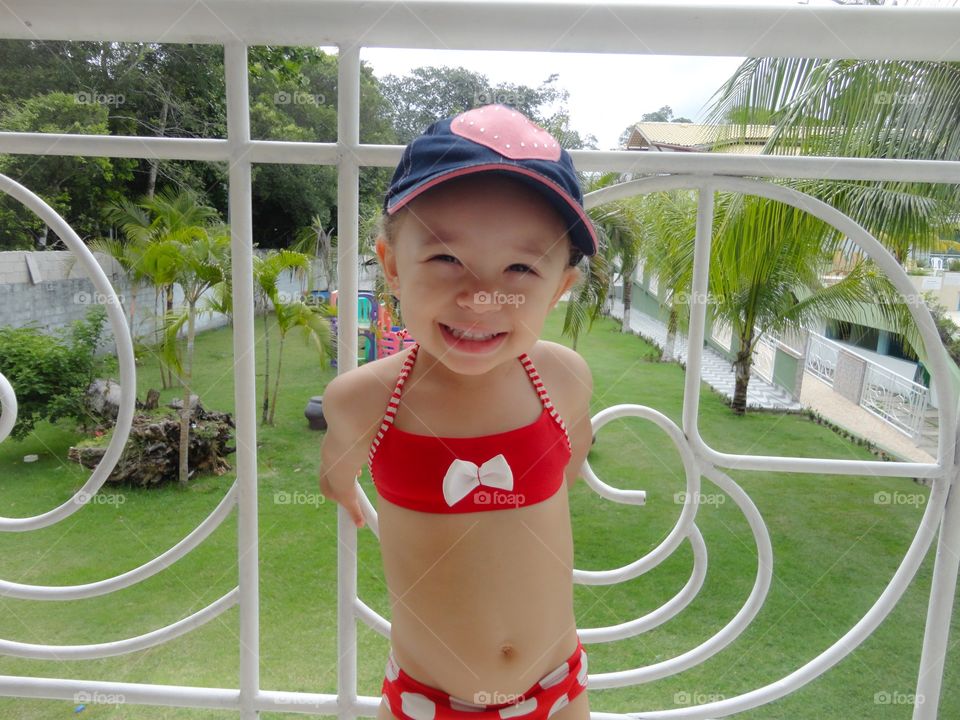 Smiling girl wearing bikini