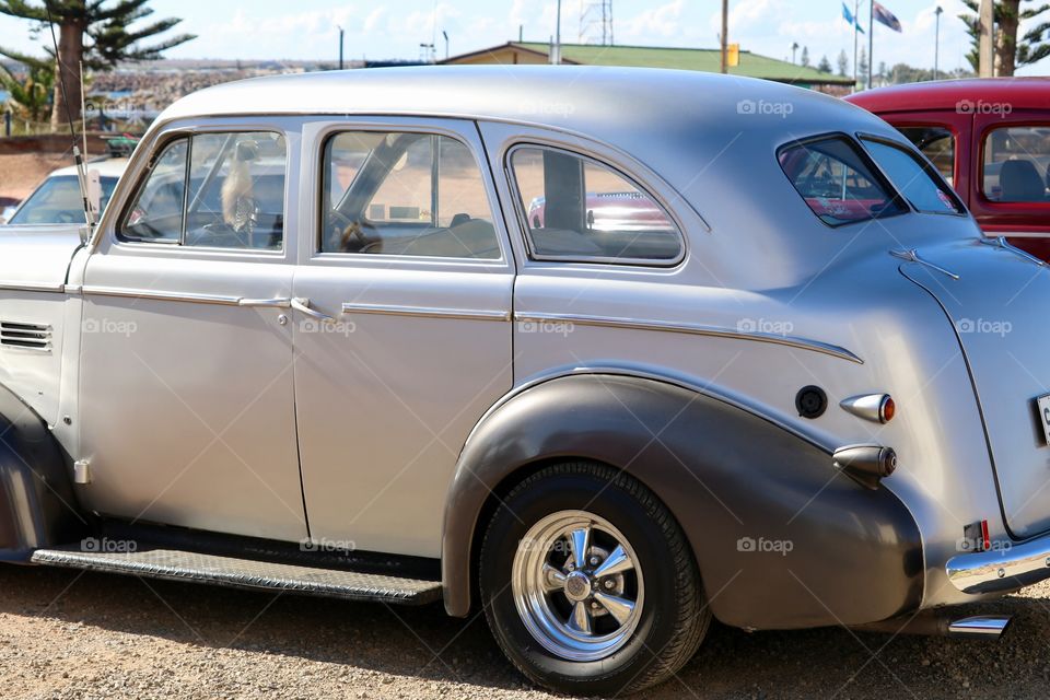 Classic silver vintage car at car show 