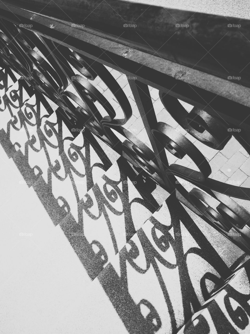 Railing Shadow . Wrought iron railing shadow