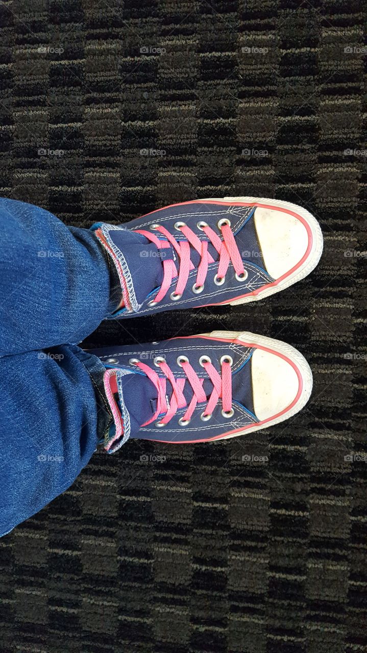 My blue and pink converse in the office.