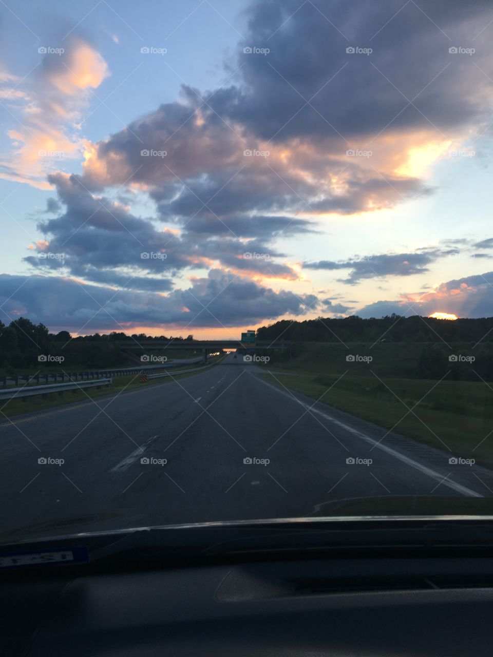 Driving down the road at sunset in North Carolina