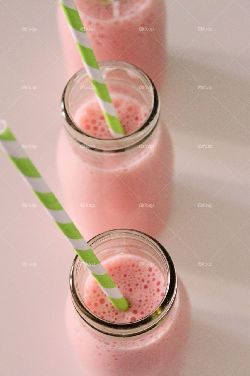 High angle view of strawberry milk