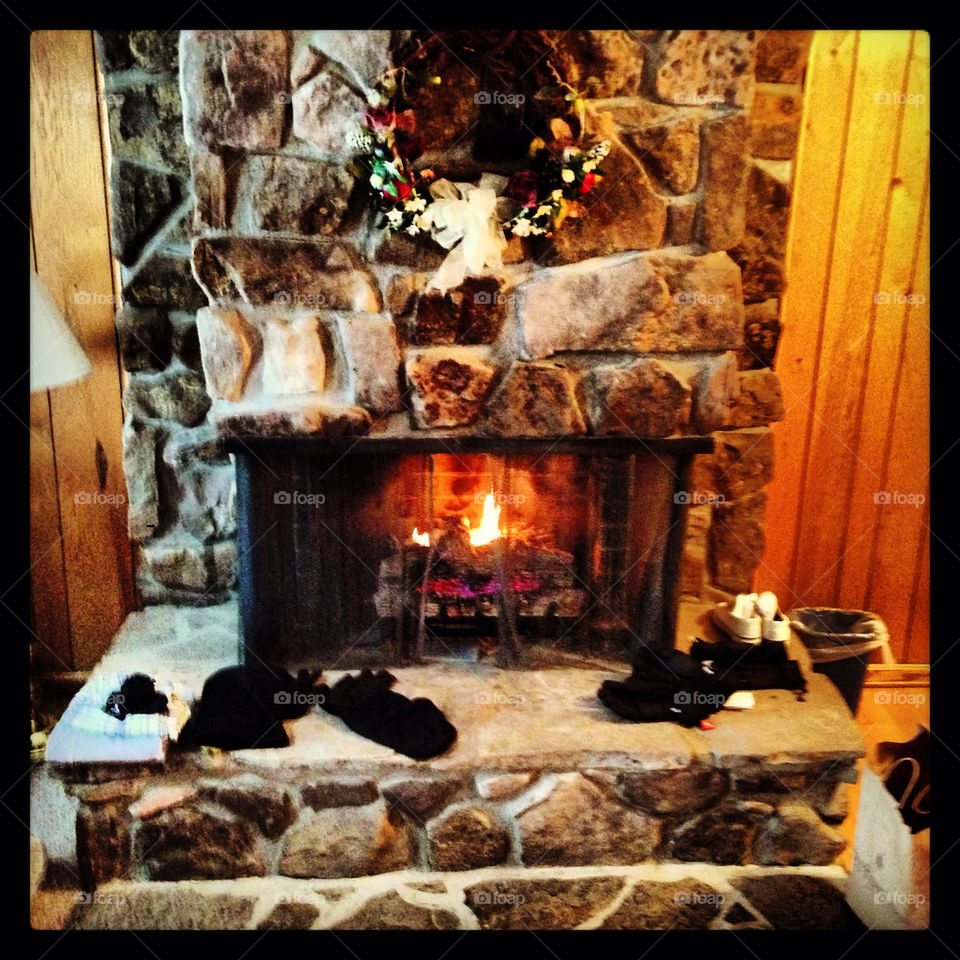 cozying up by the warm fireplace after a long day of skiing! :)