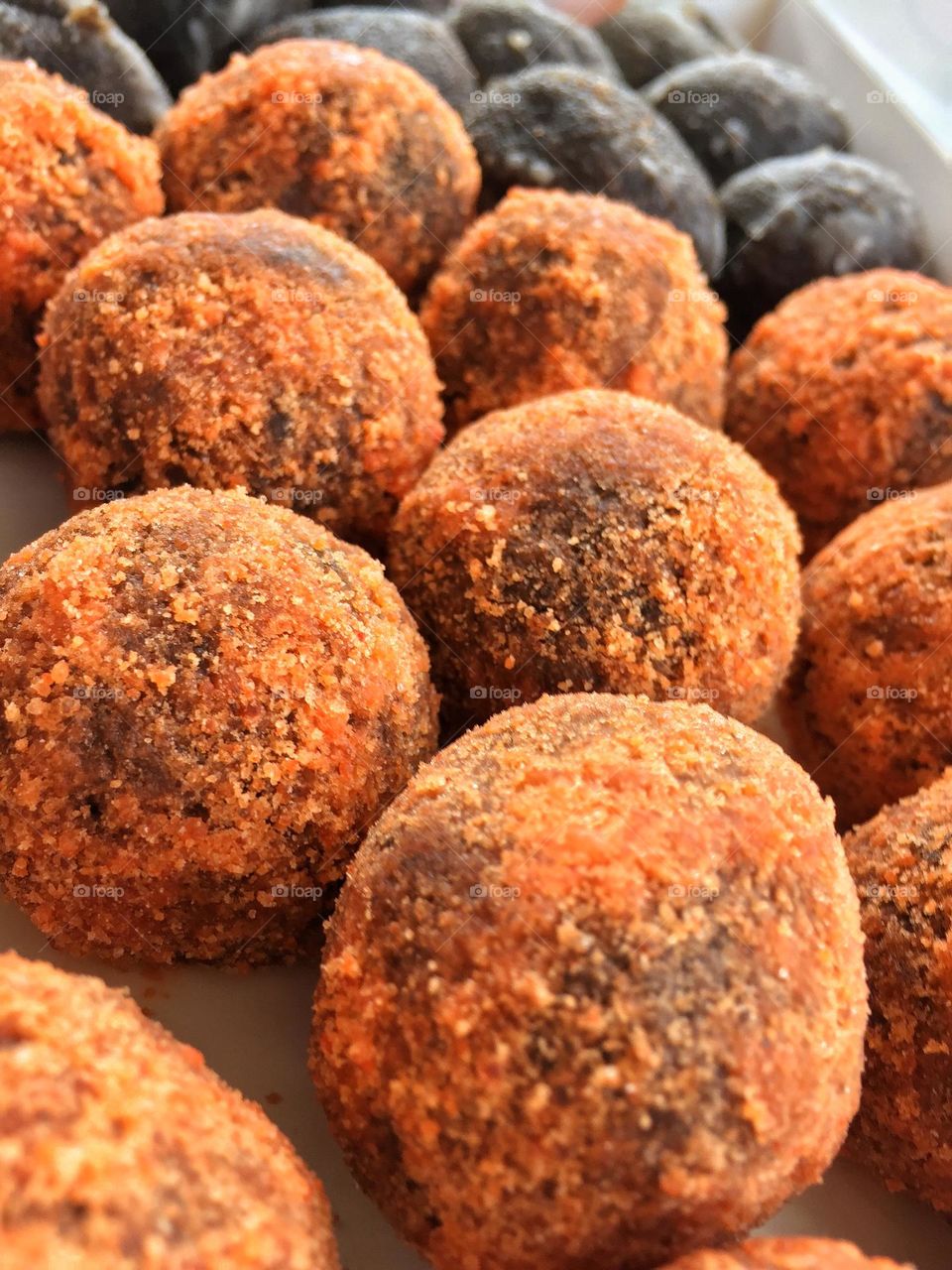 Orange and chocolate balls or munchkins