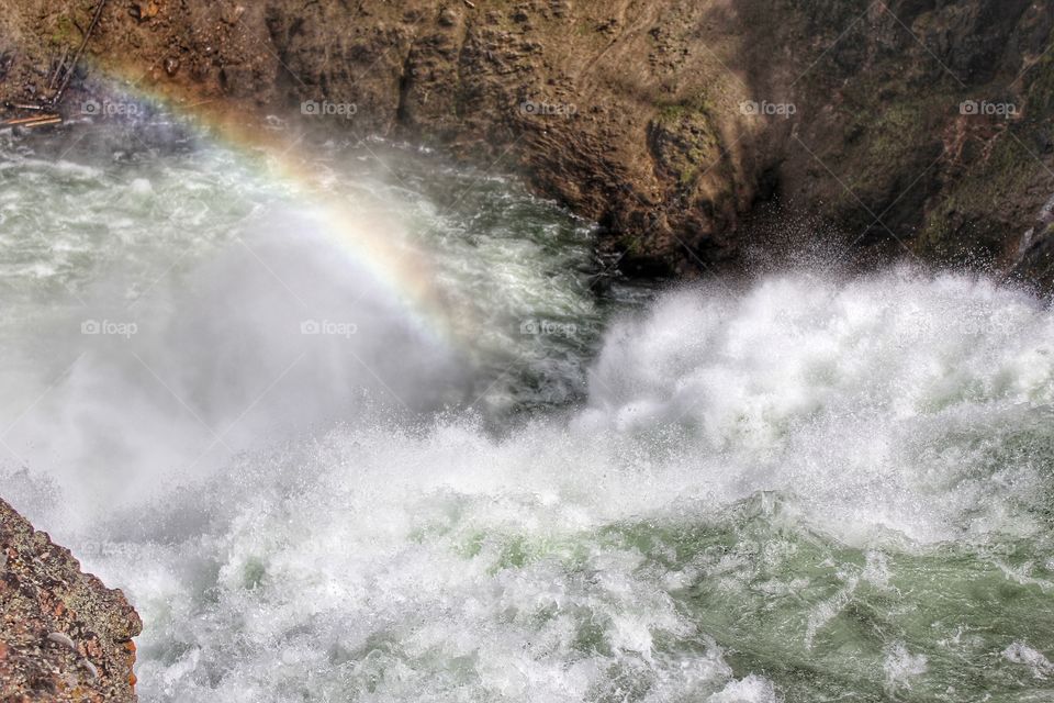 Rainbow over the stream