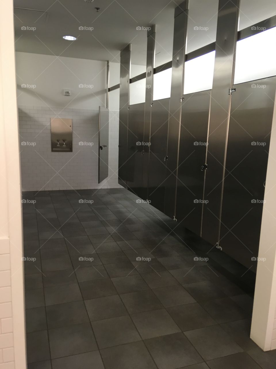 Thought this was an interesting and nice bathroom with the light shining through.