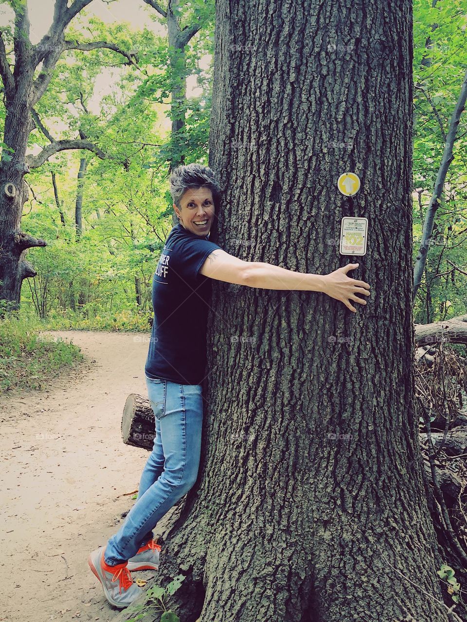 Tree hugger, woman hugging tree, woman in the forest, protecting the forest, green planet 