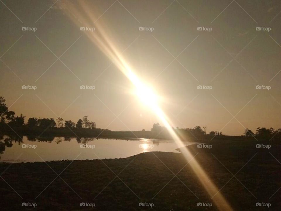 Evening sunset reflaction on the lake water