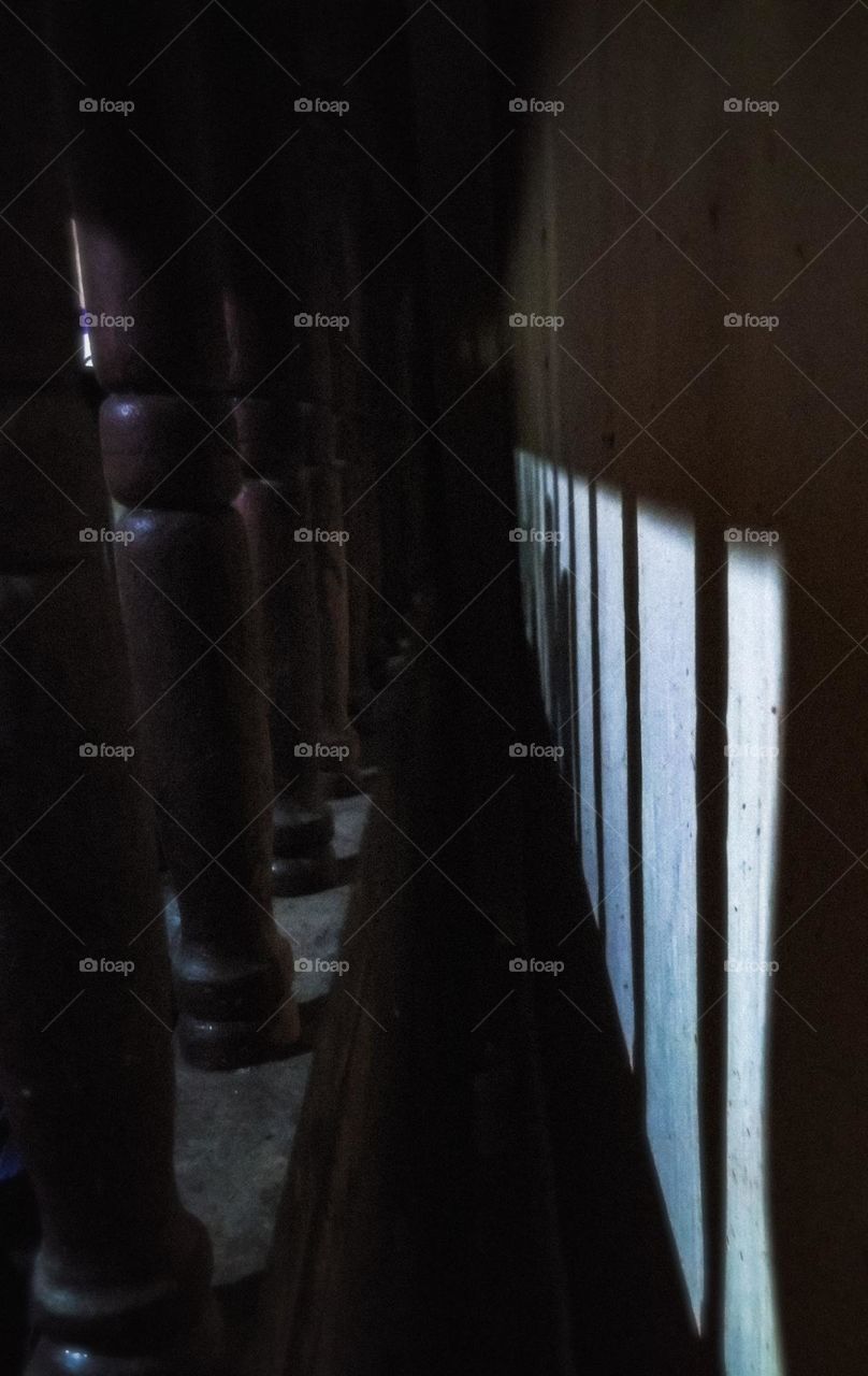 This is a  traditional architecture view and these are made by woods. This is a very creative idea with wooden sticks with their shadows. This is a reflection of a darkness and shadows .