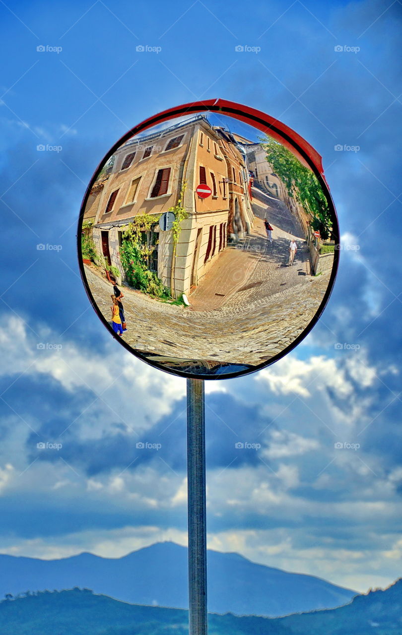 road sign, mirror in the street