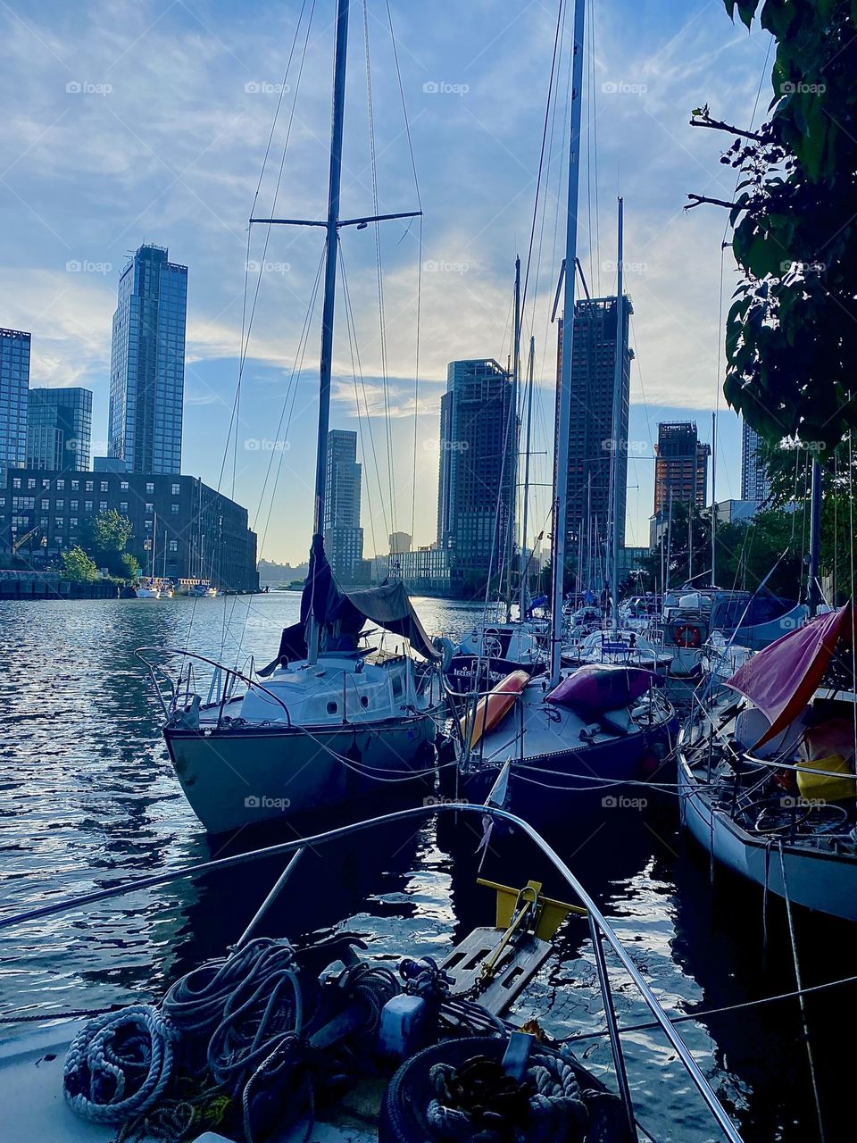 This is “Newtown Creek” by the “Pulaski Bridge” in LIC, Queens with its great variety of boats that are tied to the shore here on a beautiful warm Indian summer evening in September 2023. Hypnotic Productions