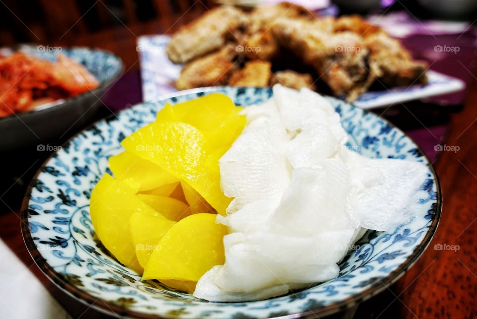 Pickled radish - yellow (daikon) and white. A popular side dish in Japanese and Korean cuisine.
