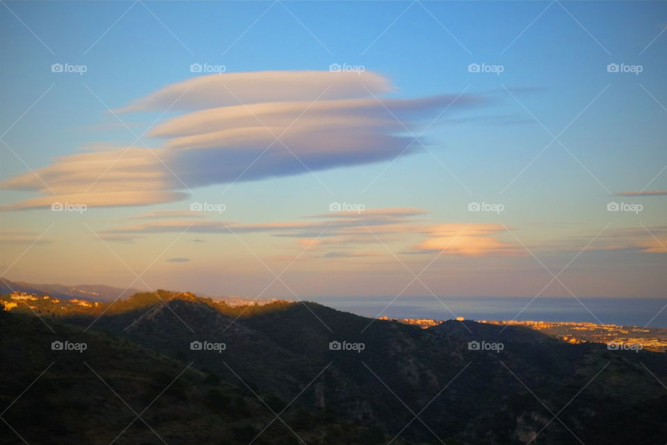 Funny clouds . Sunset over Marbella and funny clouds 