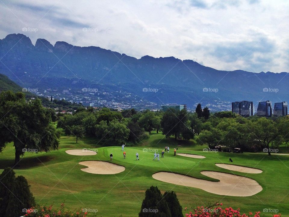 Golfers playing golg