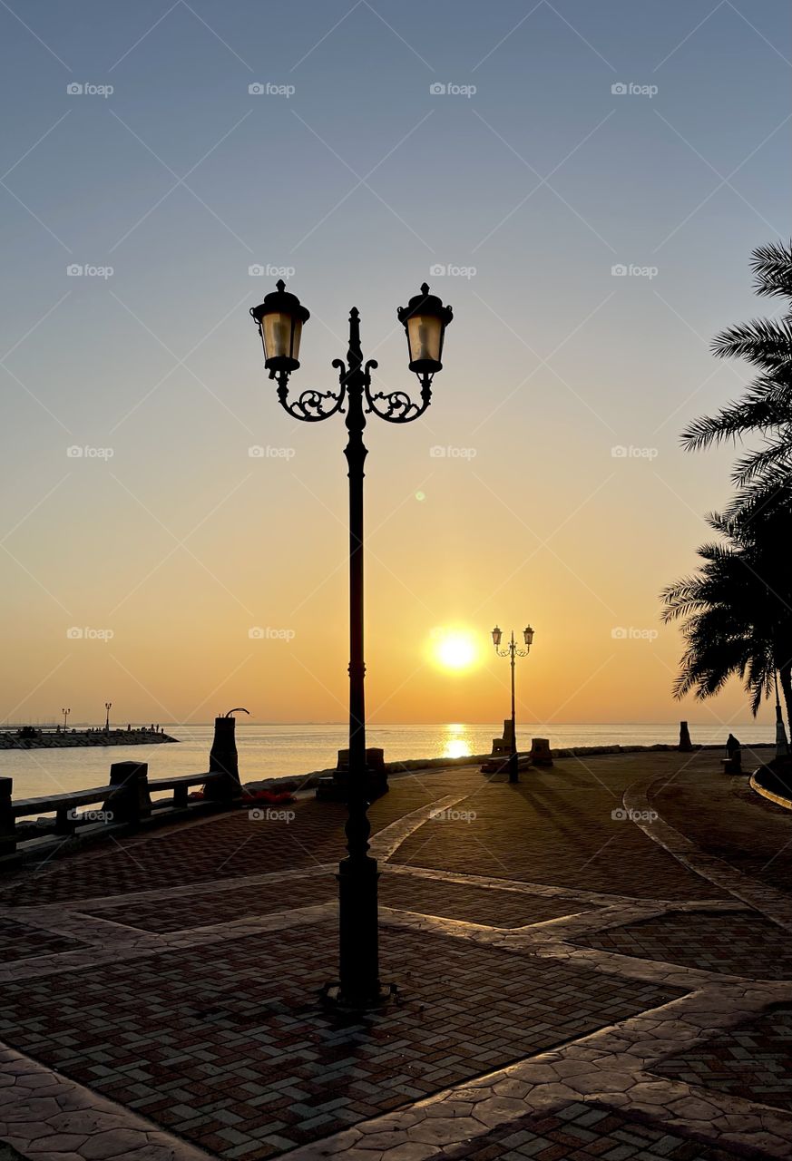 Golden sunset view from a seafront 