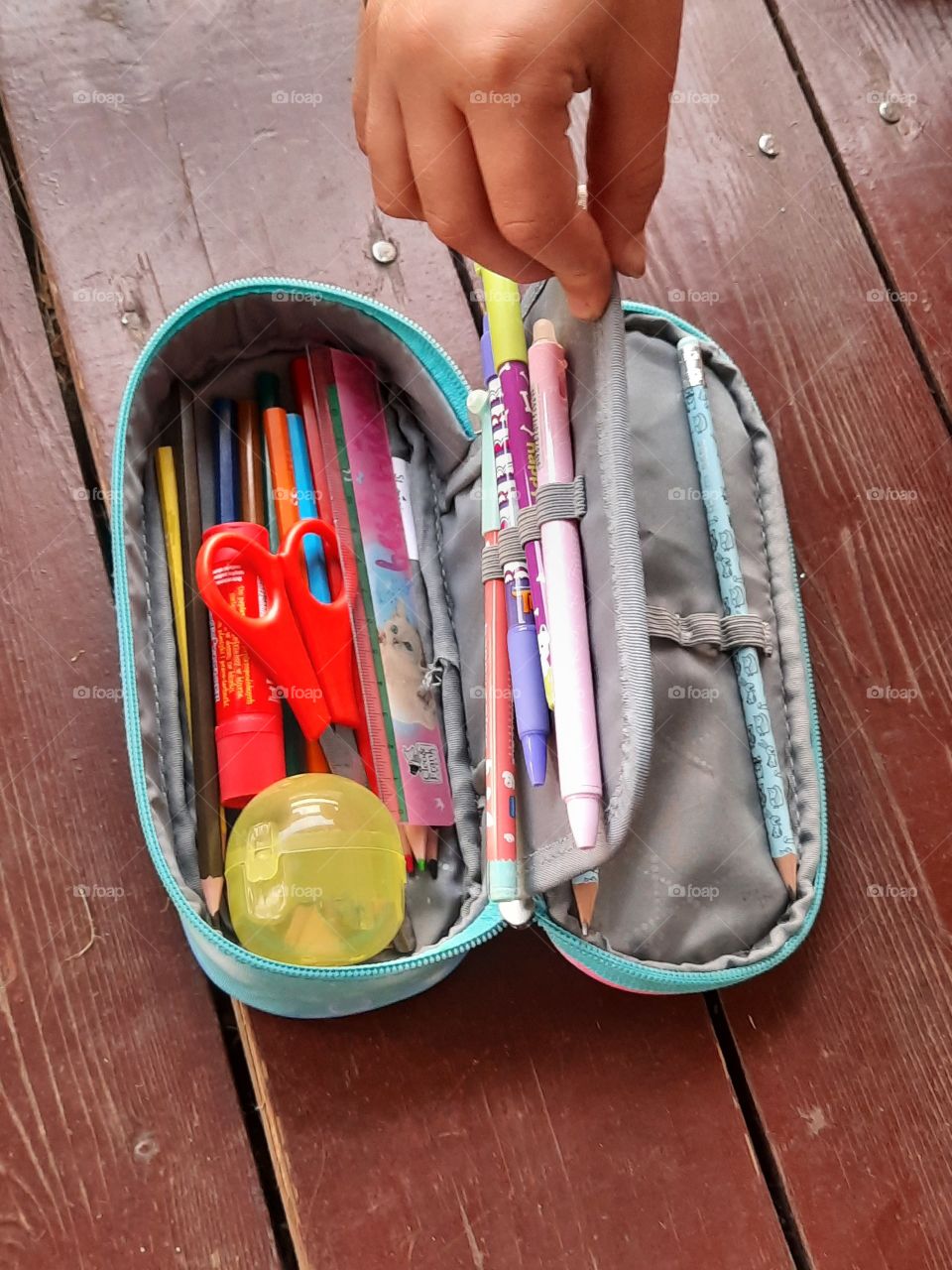 pencil box displayed by a student
