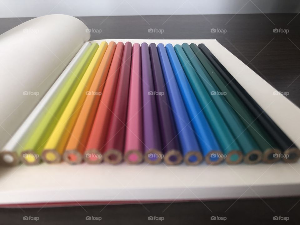 Color pencils over a notebook
