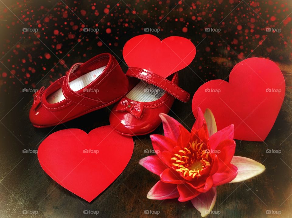 Little red shoes and paper hearts