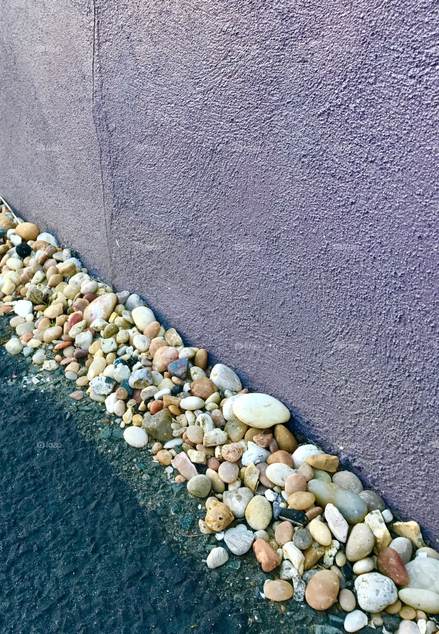 Purple Cement Wall & Rocks