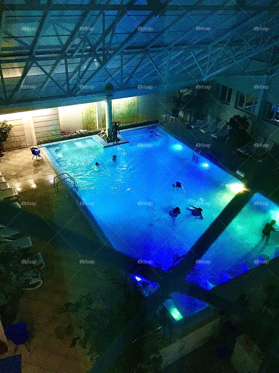 Indoor swimming pool in the evening