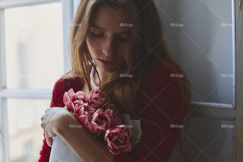 Beautiful girl with pearl necklace for recreation