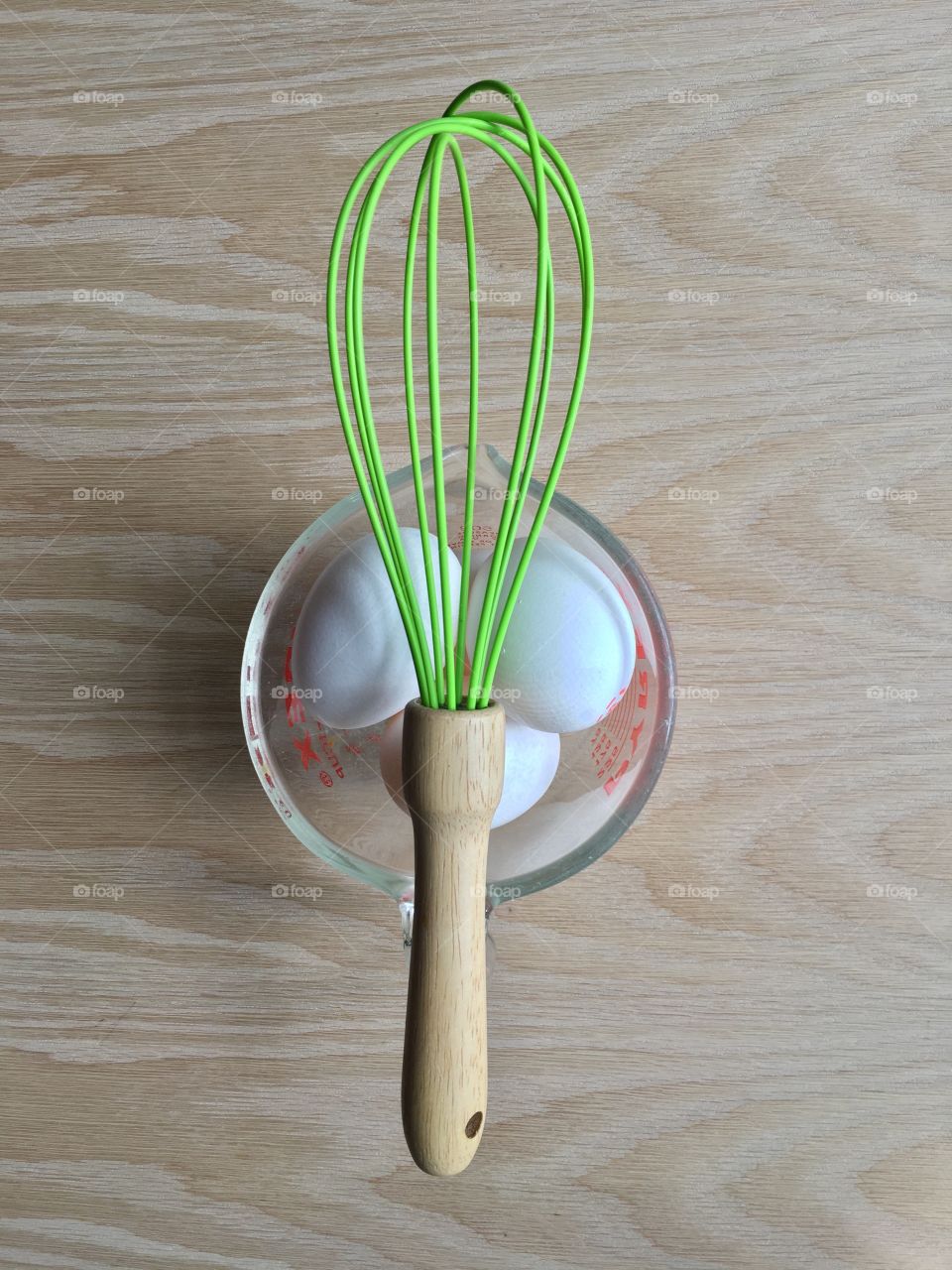 Green color story; pop of green with white eggs on a butcher block