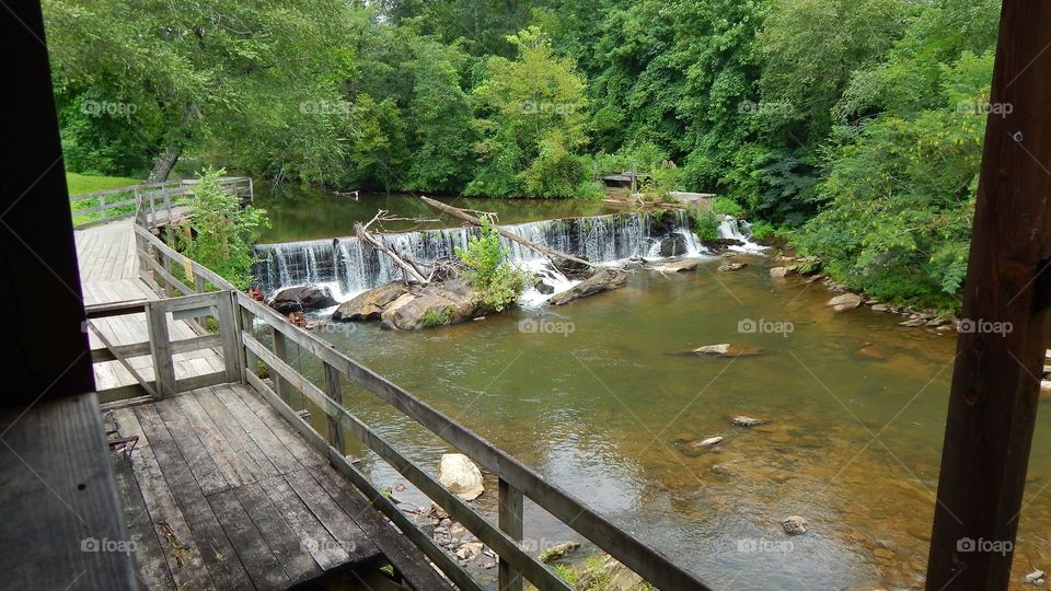 Chattahoochee river flowing behind Nora Mill Granary in Georgia