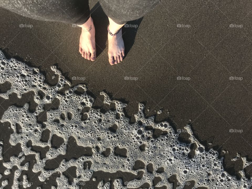 Feet and the sand