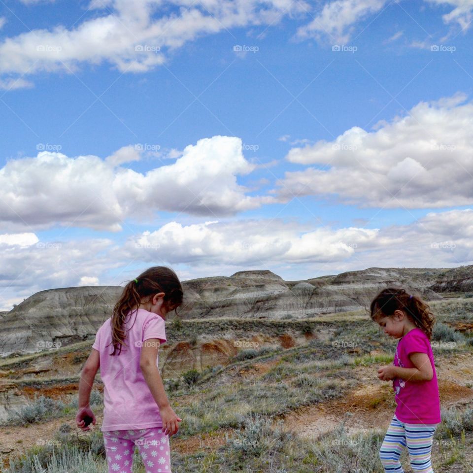 Two girls standing on mountain
