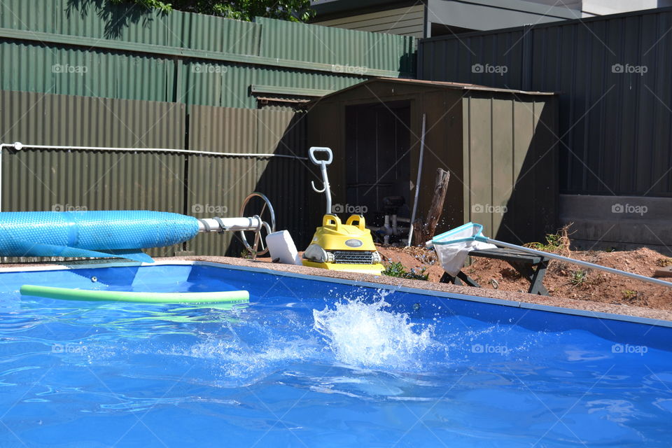 Water splash in outdoor swimming pool