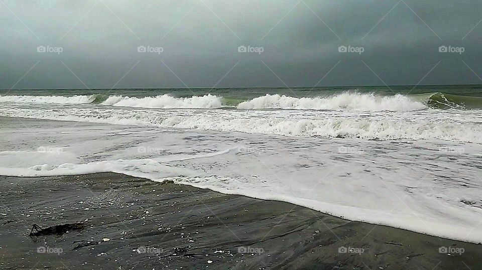 Stormy beach day off the Gulf Coast in Florida had some choppy waters and small waves.