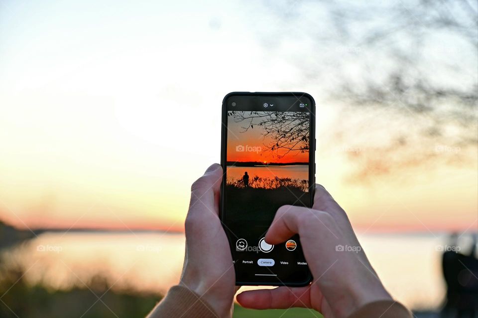 Taking pictures of sunset