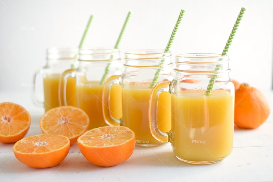 Row of Glasses of Orange Juice 