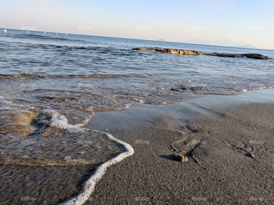 ocean waves sunshine toes on sand