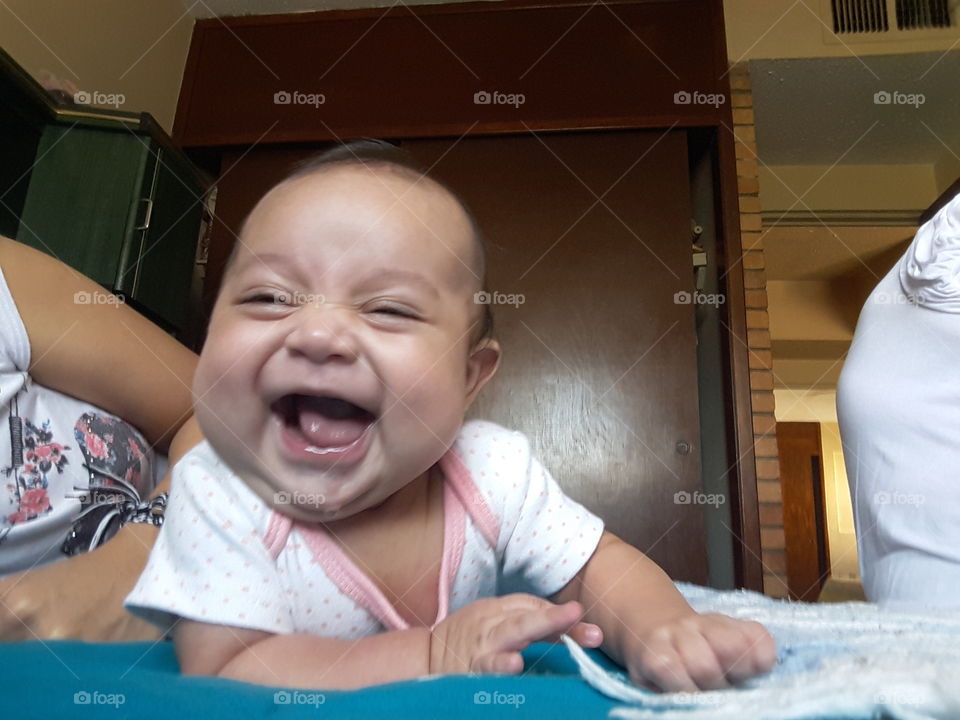 My baby Farah, she is always smiling even when she is alone or sleeping and the first thing she do when open her eyes is smile. She is so lovely!!