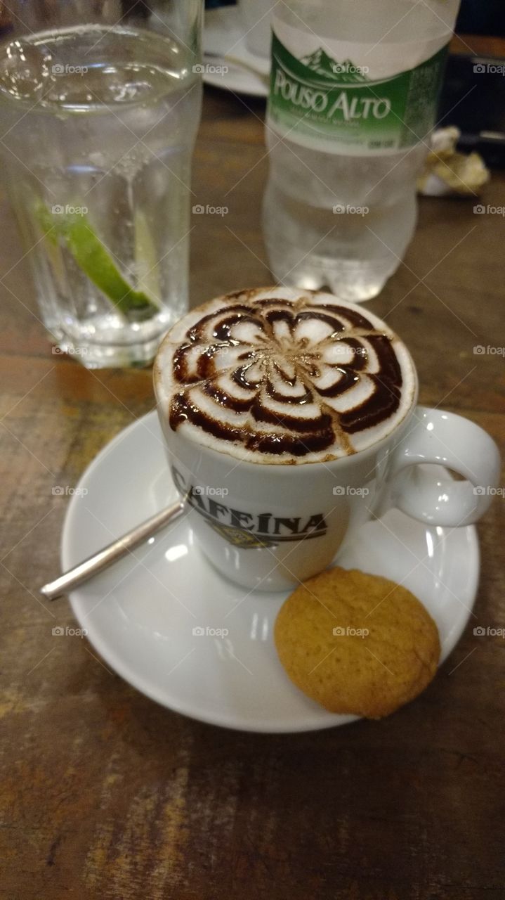 capuccino with mineral water and lemon