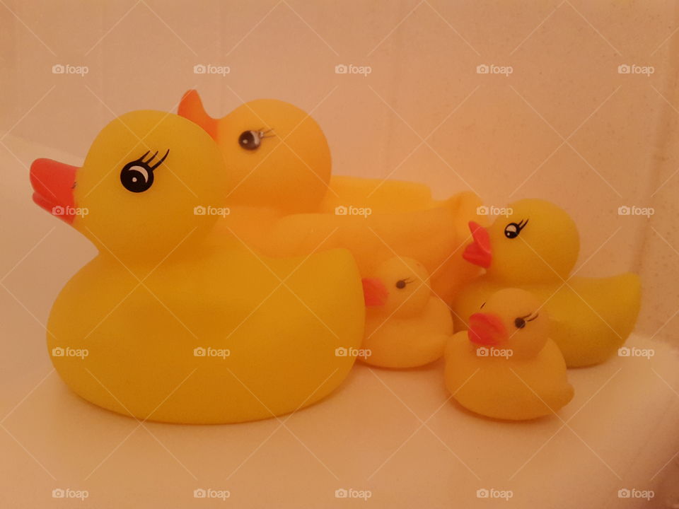 the yellow duck family that make bath time a happy time