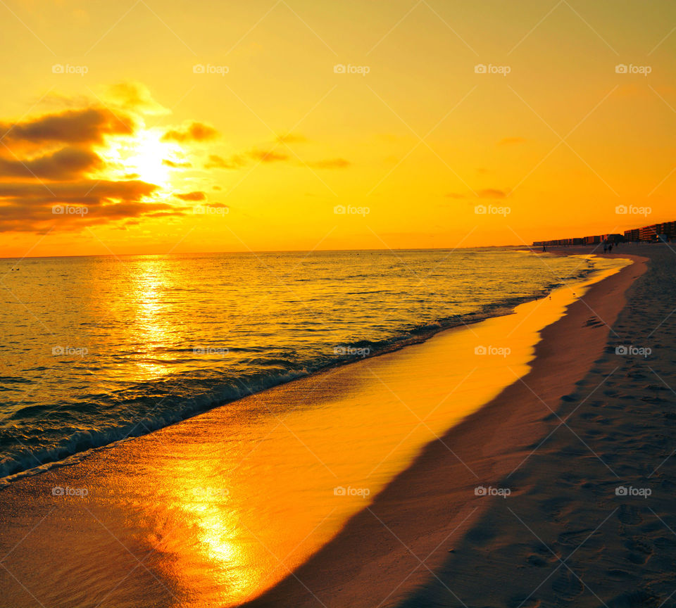 Bright orange sea at beach