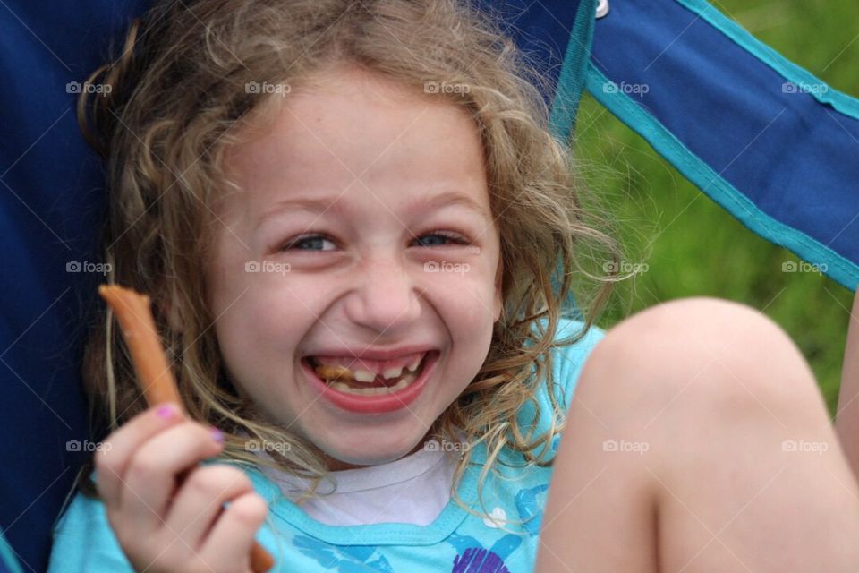 Close-up of a girl eating food