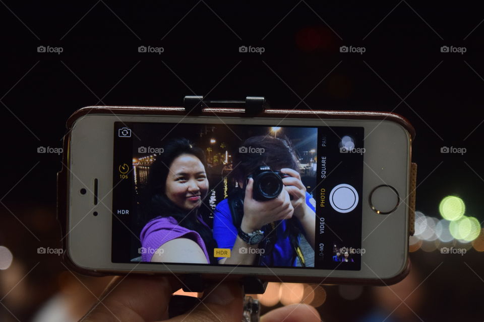 Let’s take a picture of for this friend trip. Let’s do a selfie! It’s how we can keep a photo of two in this small screen. 