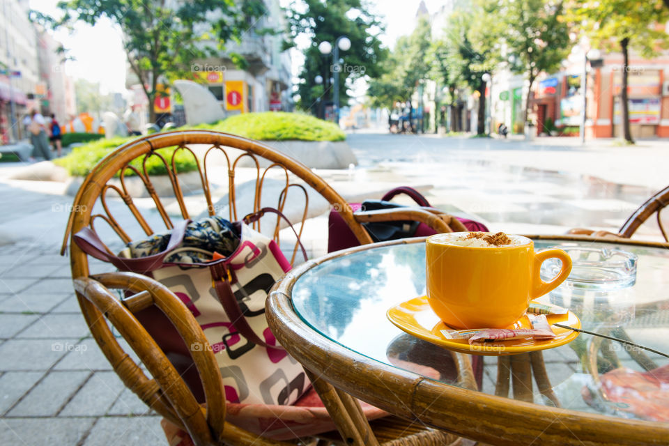 a cup of morning coffee in the street cafe