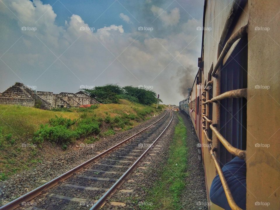 Train or railway with surrounding natural beauty - Indian public transportation system.