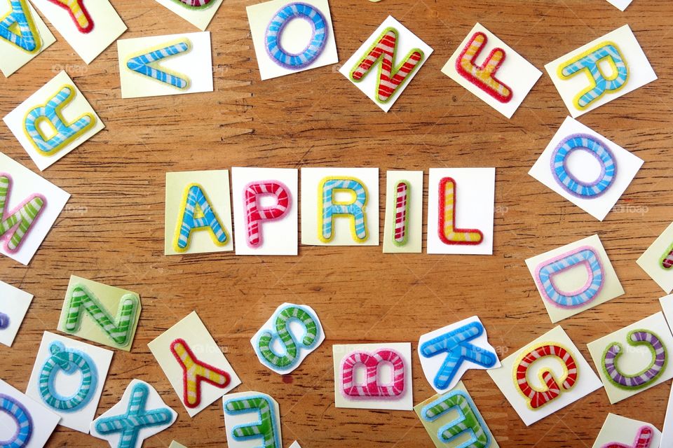 the word april. the word april spelled in colorful letters