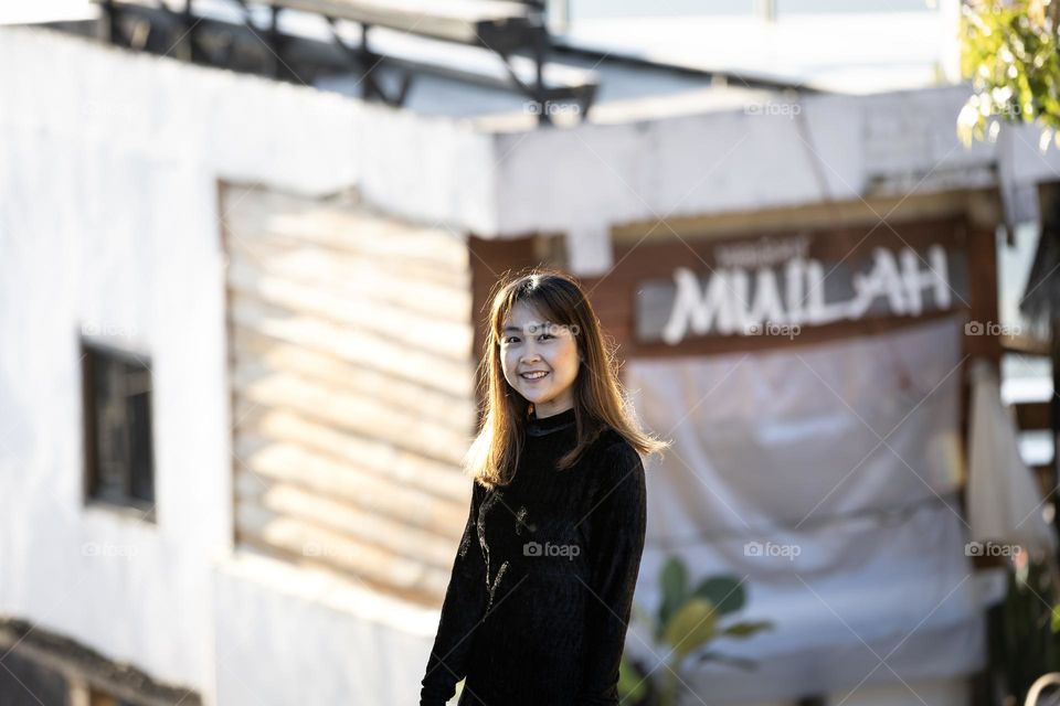 A pretty lady in front of coffee shop Pha Hee Mountain